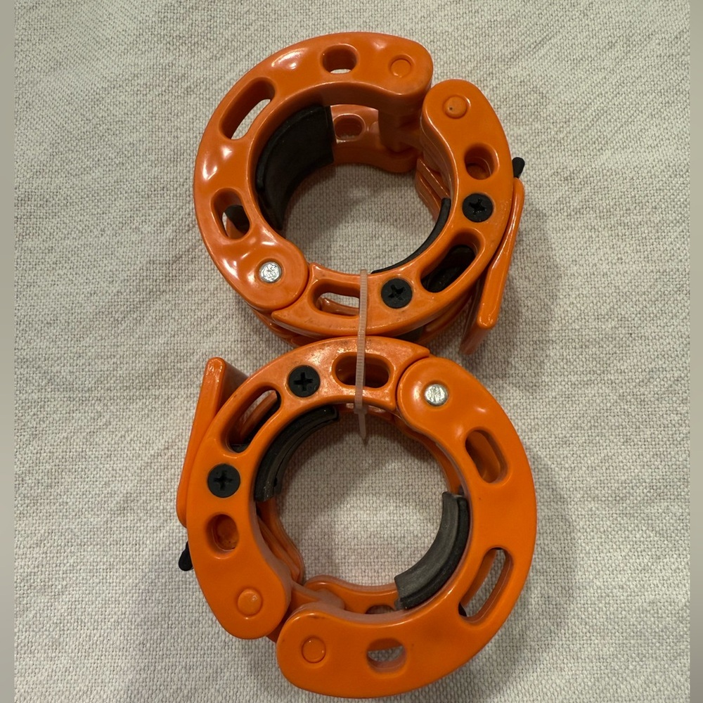 NWOT/ Orange Barbell Clamps